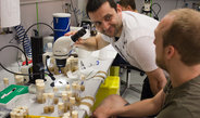Plamen Georgiev in conversation with a fly facility user.